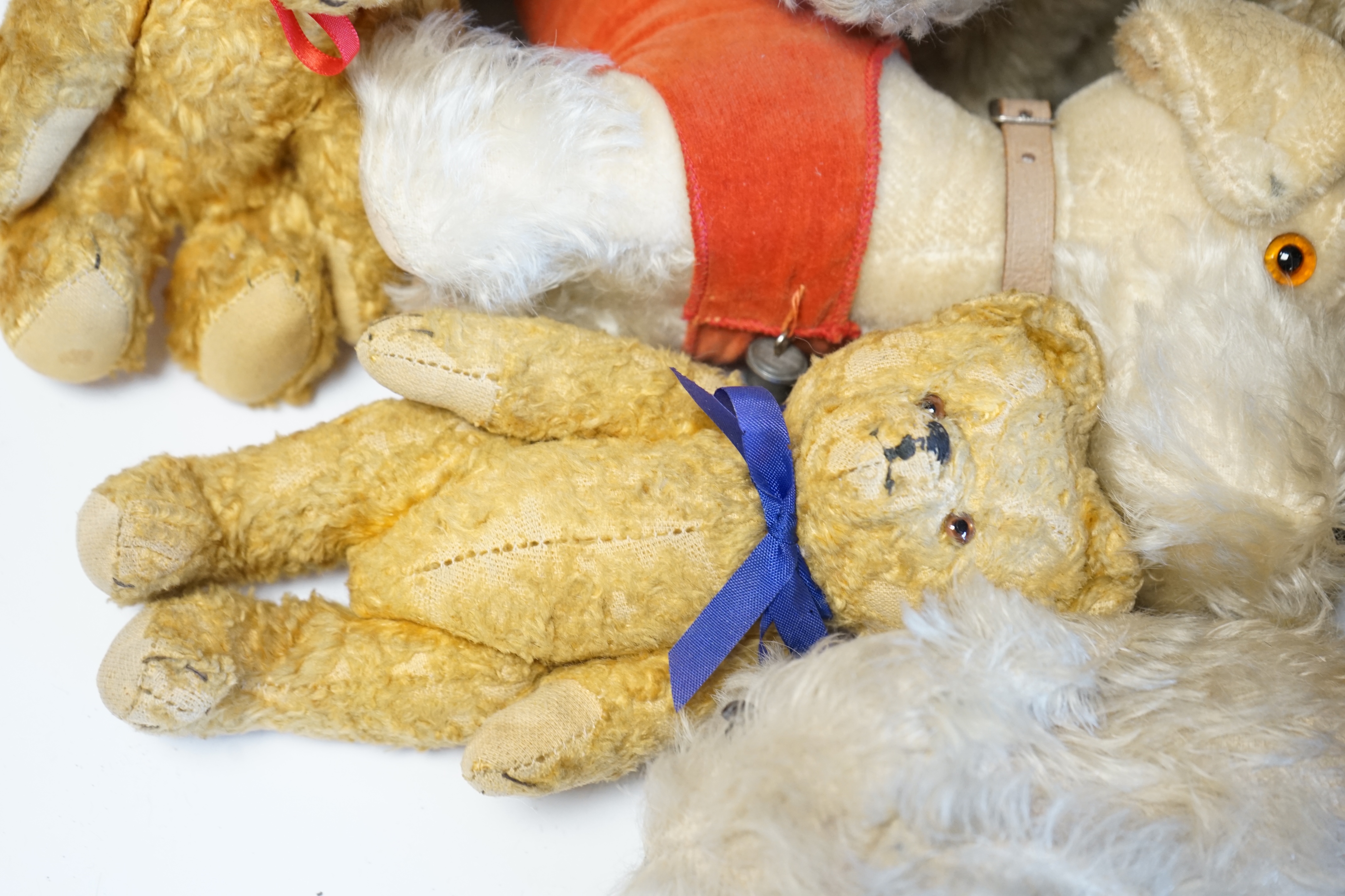 Four Merrythought dogs and three others, c.1950's, together with three cotton plush bears and one rabbit (11). Condition - fair